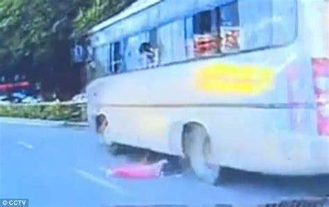 He went up to change he music and then the bus swerved a bit and he hit the door, which caused the door to open, flinging him out in the highway. . Girl falls out of bus and gets run over video